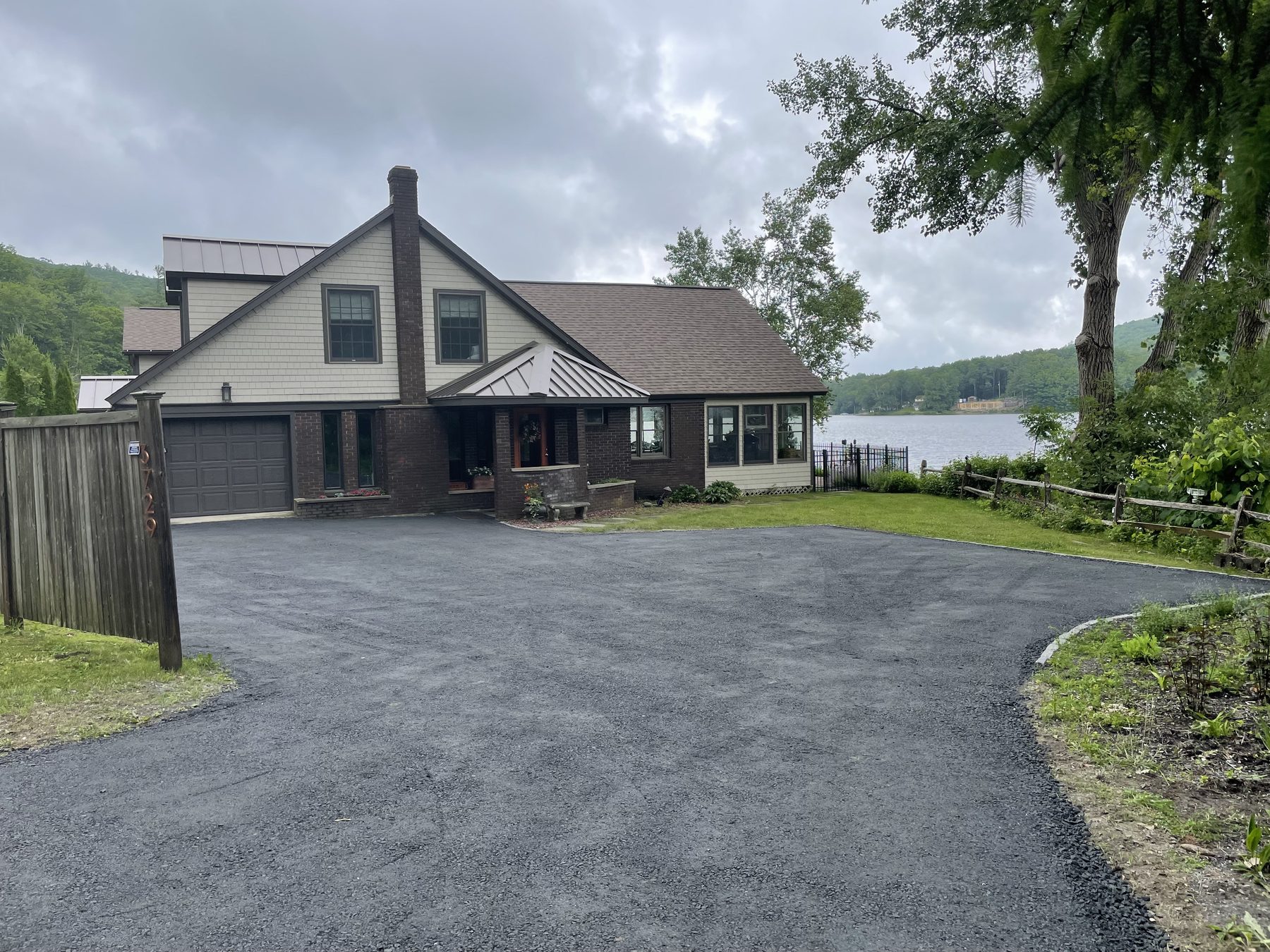 Paved driveway and turnaround at a lakeside Berkshire County home