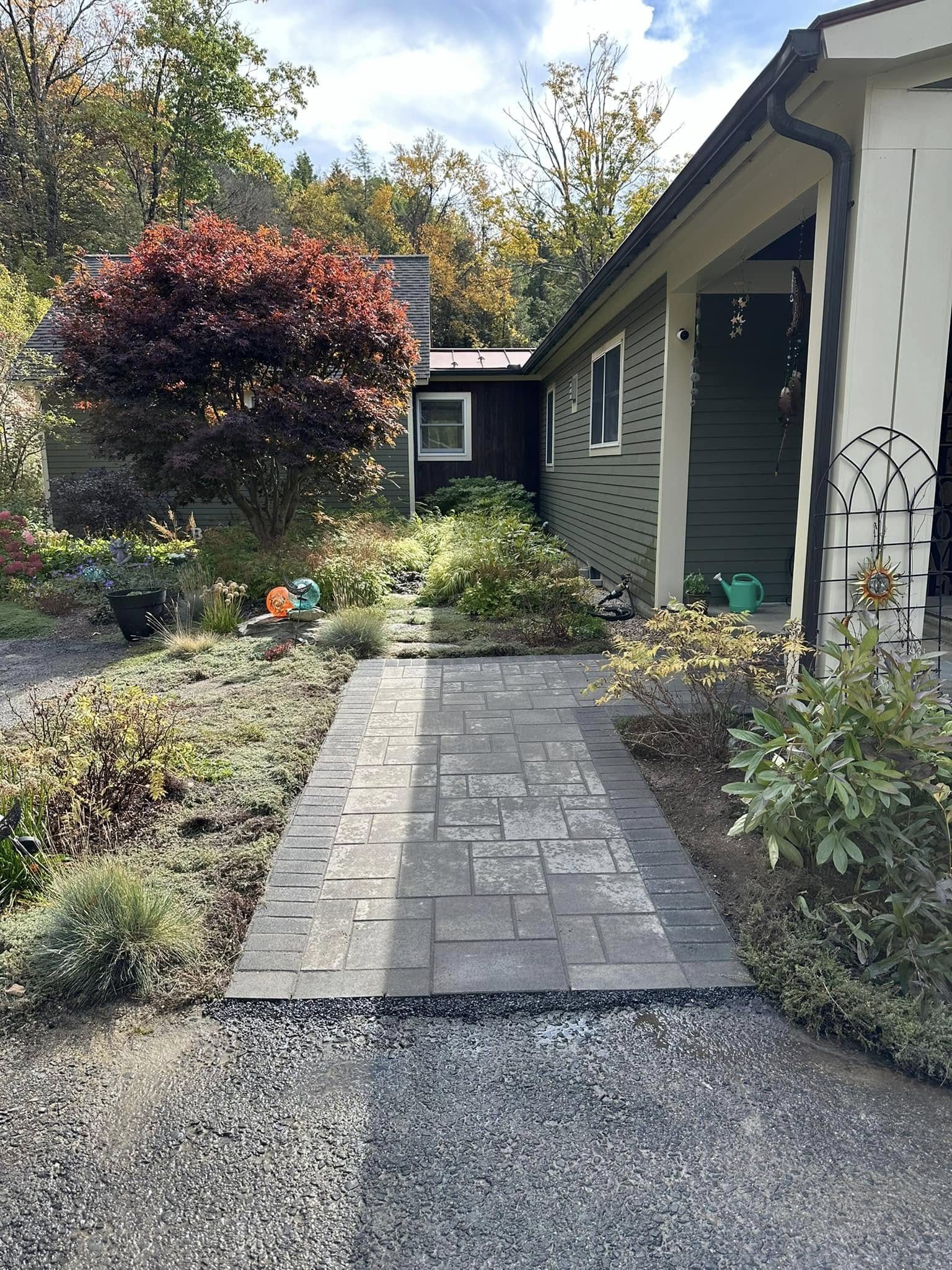 Paver walkway running between two buildings