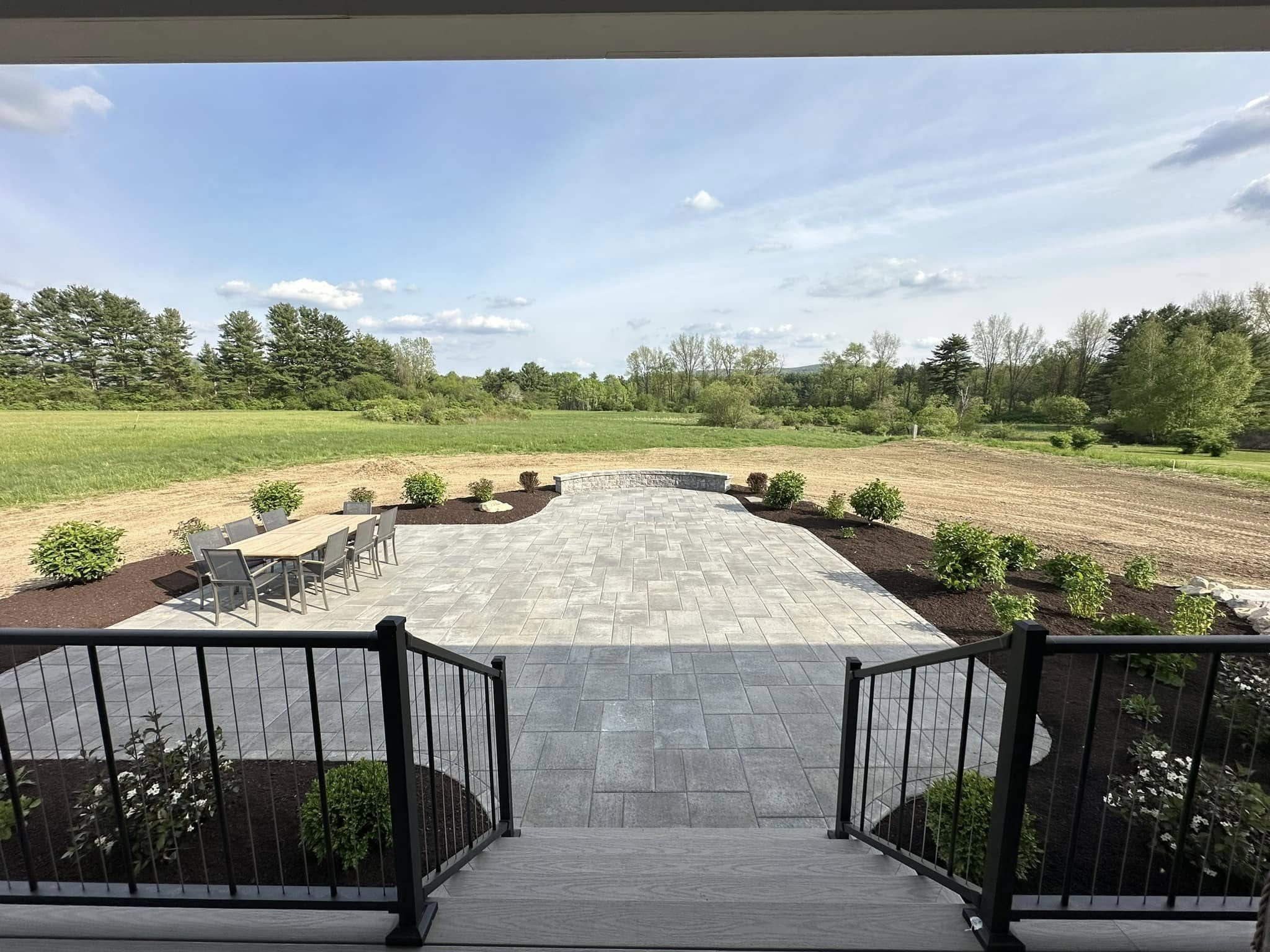 Paver patio and steps looking out over a Berkshire valley