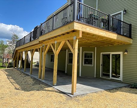 Patio and timber framing beneath a raised deck